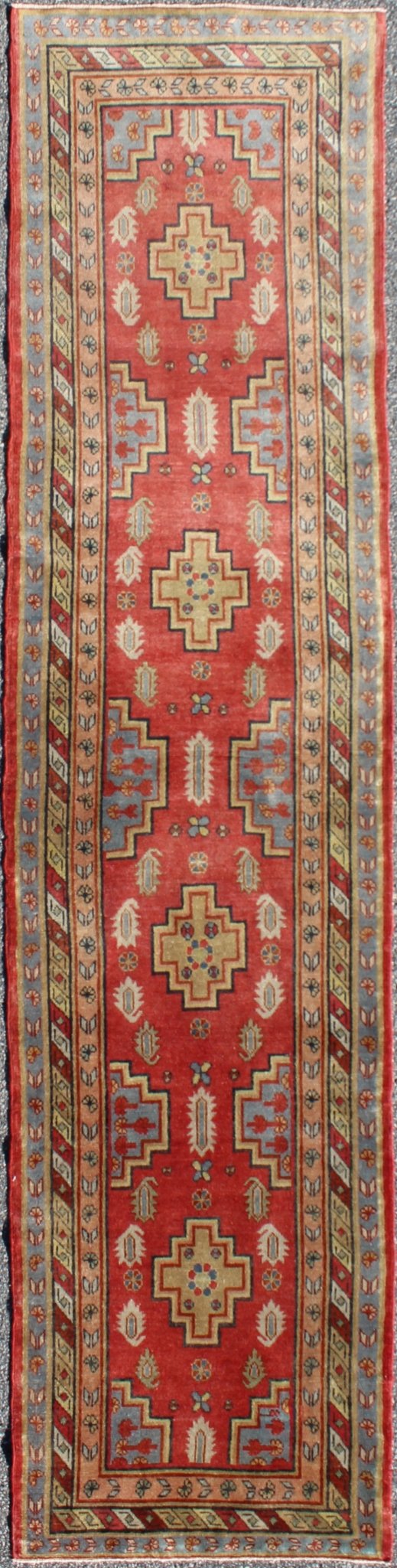 Antique Khotan Runner from Turkestan with four geometric medallions in red background and multi colors, rug tu - mtu - 4648, country of origin / type: East Turkestan / Khotan, circa 1920 This geometric antique Khotan rug was handcrafted in Turkestan... - Keivan Woven ArtsTU - MTU - 4648 - 9170Rug