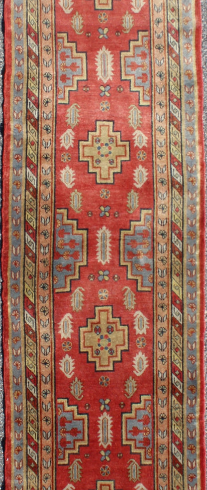 Antique Khotan Runner from Turkestan with four geometric medallions in red background and multi colors, rug tu - mtu - 4648, country of origin / type: East Turkestan / Khotan, circa 1920 This geometric antique Khotan rug was handcrafted in Turkestan... - Keivan Woven ArtsTU - MTU - 4648 - 9170Rug