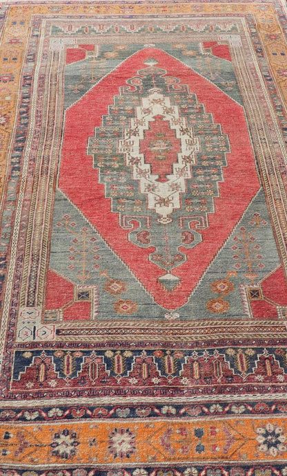 Vintage Turkish Oushak Rug Medallion Design in Red, Gray, and Orange. Measures: 5'7 x 9'11 Vintage Turkish Oushak Rug Medallion Design in Red, Gray, and Orange. Keivan Woven Arts / rug TU - MTU - 4658, country of origin / type: Turkey / Oushak, circ... - Keivan Woven ArtsTU - MTU - 4658 - 22009Rug