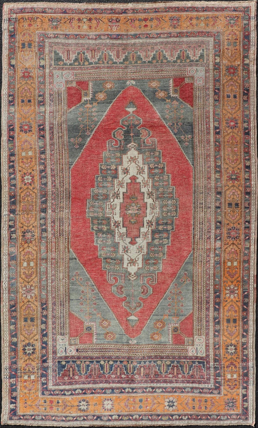 Vintage Turkish Oushak Rug Medallion Design in Red, Gray, and Orange. Measures: 5'7 x 9'11 Vintage Turkish Oushak Rug Medallion Design in Red, Gray, and Orange. Keivan Woven Arts / rug TU - MTU - 4658, country of origin / type: Turkey / Oushak, circ... - Keivan Woven ArtsTU - MTU - 4658 - 22009Rug