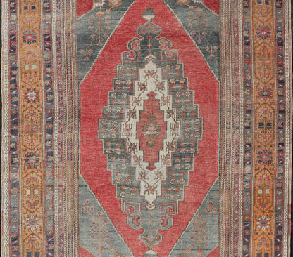 Vintage Turkish Oushak Rug Medallion Design in Red, Gray, and Orange. Measures: 5'7 x 9'11 Vintage Turkish Oushak Rug Medallion Design in Red, Gray, and Orange. Keivan Woven Arts / rug TU - MTU - 4658, country of origin / type: Turkey / Oushak, circ... - Keivan Woven ArtsTU - MTU - 4658 - 22009Rug