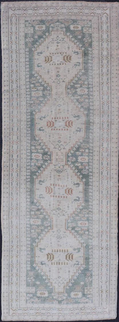 Measures: 3'2 x 9'4 Vintage Turkish Oushak Rug with Central Medallions in Cream and Light Green. Keivan Woven Arts / Rug TU - MTU - 4660, country of origin / type: Turkey / Oushak, circa mid - 20th century. This vintage Turkish Oushak rug (circa mid - 2... - Keivan Woven ArtsTU - MTU - 4660 - 22015Rug