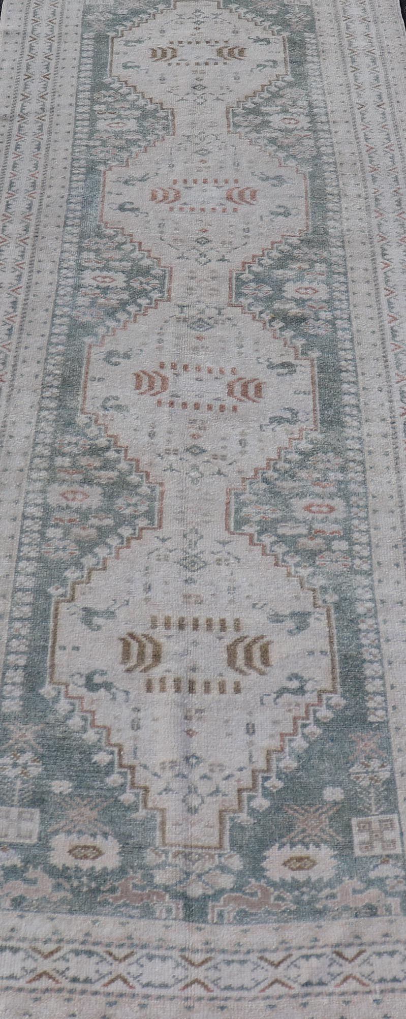 Measures: 3'2 x 9'4 Vintage Turkish Oushak Rug with Central Medallions in Cream and Light Green. Keivan Woven Arts / Rug TU - MTU - 4660, country of origin / type: Turkey / Oushak, circa mid - 20th century. This vintage Turkish Oushak rug (circa mid - 2... - Keivan Woven ArtsTU - MTU - 4660 - 22015Rug