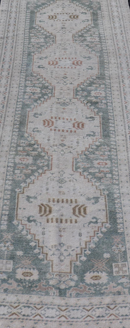 Measures: 3'2 x 9'4 Vintage Turkish Oushak Rug with Central Medallions in Cream and Light Green. Keivan Woven Arts / Rug TU - MTU - 4660, country of origin / type: Turkey / Oushak, circa mid - 20th century. This vintage Turkish Oushak rug (circa mid - 2... - Keivan Woven ArtsTU - MTU - 4660 - 22015Rug