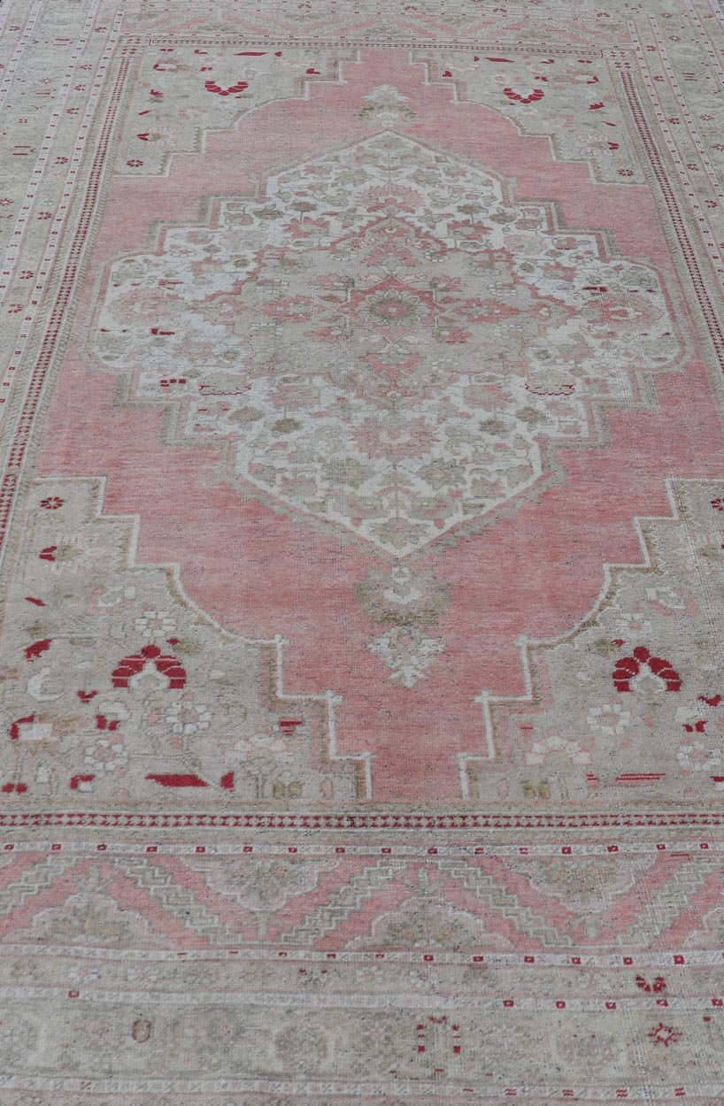 Measures: 7'8 x 13'5 Turkish Vintage Oushak Rug with Geometric Design With A Soft Coral Color. Country of Origin: Turkey; Type: Oushak; Design: Medallion, Tribal Medallion, Diamond Medallion; Keivan Woven Arts: rug / TU - MTU - 4664 / mid - 20th Century ... - Keivan Woven ArtsTU - MTU - 4664 - 22033Rug