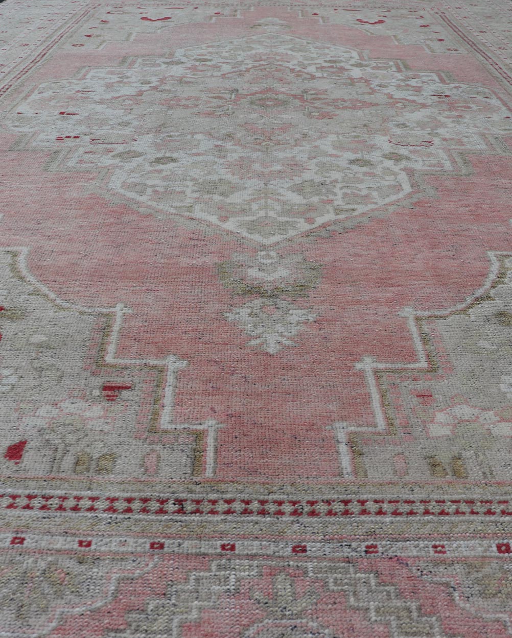 Measures: 7'8 x 13'5 Turkish Vintage Oushak Rug with Geometric Design With A Soft Coral Color. Country of Origin: Turkey; Type: Oushak; Design: Medallion, Tribal Medallion, Diamond Medallion; Keivan Woven Arts: rug / TU - MTU - 4664 / mid - 20th Century ... - Keivan Woven ArtsTU - MTU - 4664 - 22033Rug