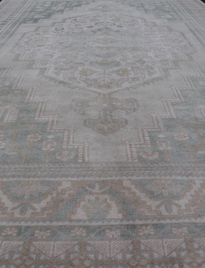 Measures: 6'4 x 11'9 Turkish Vintage Oushak Rug With Medallion in Muted Light Green and Cream. Keivan Woven Arts / rug TU - MTU - 4665 country of origin / type: Turkey / circa 1940 This vintage muted Turkish Oushak Rug has been hand - knotted in ... - Keivan Woven ArtsTU - MTU - 4665 - 22039Rug