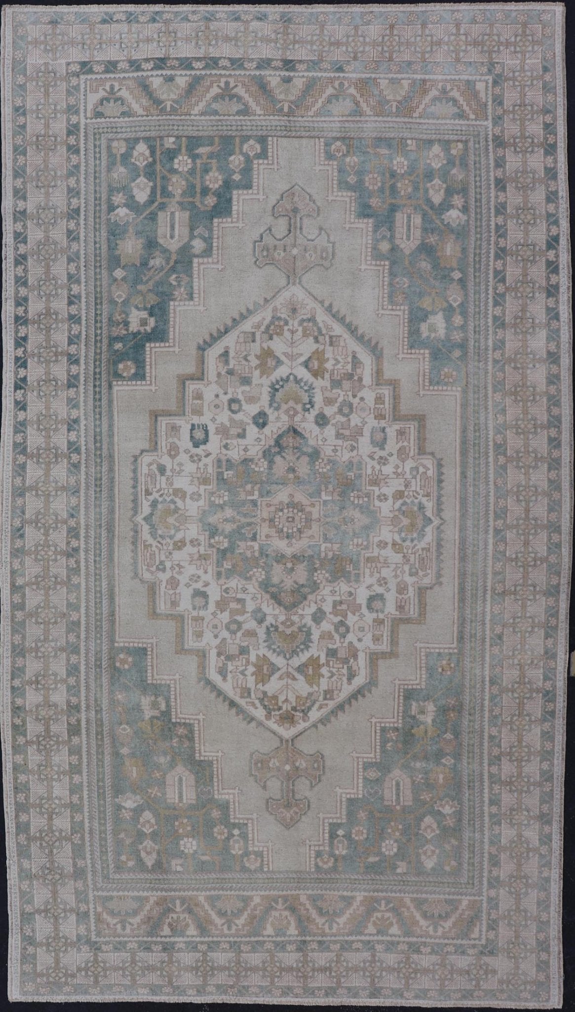 Measures: 6'4 x 11'9 Turkish Vintage Oushak Rug With Medallion in Muted Light Green and Cream. Keivan Woven Arts / rug TU - MTU - 4665 country of origin / type: Turkey / circa 1940 This vintage muted Turkish Oushak Rug has been hand - knotted in ... - Keivan Woven ArtsTU - MTU - 4665 - 22039Rug