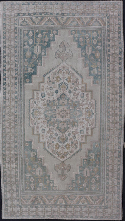 Measures: 6'4 x 11'9 Turkish Vintage Oushak Rug With Medallion in Muted Light Green and Cream. Keivan Woven Arts / rug TU - MTU - 4665 country of origin / type: Turkey / circa 1940 This vintage muted Turkish Oushak Rug has been hand - knotted in ... - Keivan Woven ArtsTU - MTU - 4665 - 22039Rug