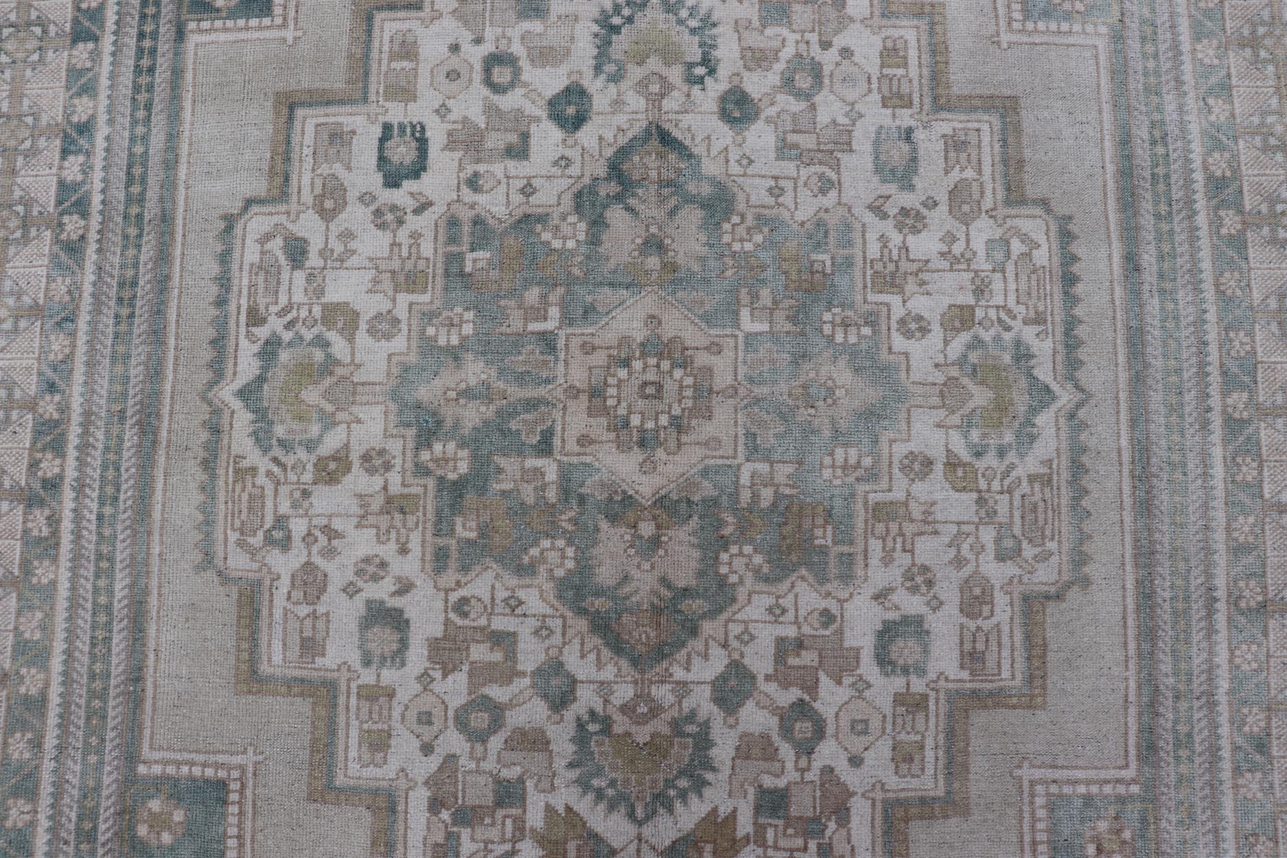 Measures: 6'4 x 11'9 Turkish Vintage Oushak Rug With Medallion in Muted Light Green and Cream. Keivan Woven Arts / rug TU - MTU - 4665 country of origin / type: Turkey / circa 1940 This vintage muted Turkish Oushak Rug has been hand - knotted in ... - Keivan Woven ArtsTU - MTU - 4665 - 22039Rug