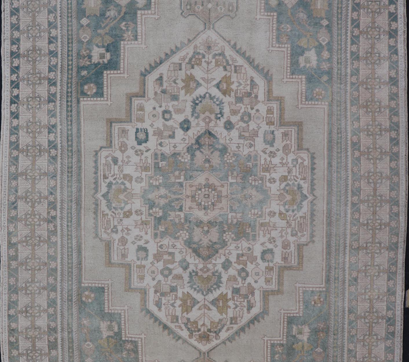 Measures: 6'4 x 11'9 Turkish Vintage Oushak Rug With Medallion in Muted Light Green and Cream. Keivan Woven Arts / rug TU - MTU - 4665 country of origin / type: Turkey / circa 1940 This vintage muted Turkish Oushak Rug has been hand - knotted in ... - Keivan Woven ArtsTU - MTU - 4665 - 22039Rug