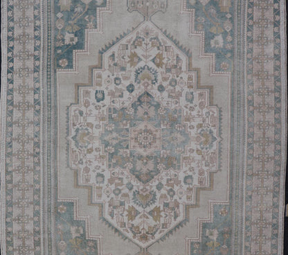 Measures: 6'4 x 11'9 Turkish Vintage Oushak Rug With Medallion in Muted Light Green and Cream. Keivan Woven Arts / rug TU - MTU - 4665 country of origin / type: Turkey / circa 1940 This vintage muted Turkish Oushak Rug has been hand - knotted in ... - Keivan Woven ArtsTU - MTU - 4665 - 22039Rug