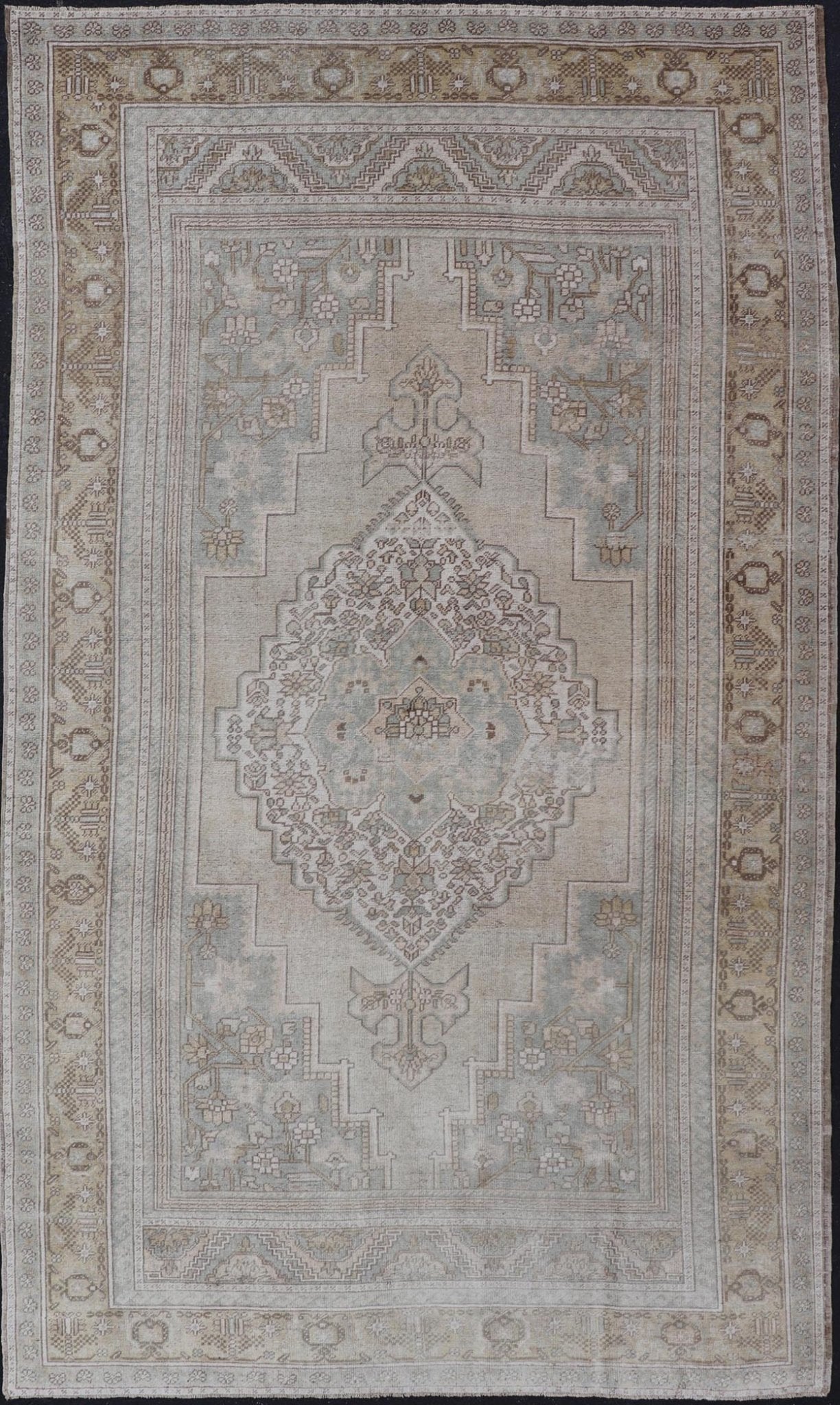 Measures: 6'8 x 12'2 Vintage Turkish Floral Medallion Oushak Rug in Light Brown and Light Blue. Country of origin: Turkey; Type: Oushak; Design: Medallion, Floral Medallion; Keivan Woven Arts: rug / TU - MTU - 4666. mid - 20 - th century. Set on a k... - Keivan Woven ArtsTU - MTU - 4666 - 22045Rug