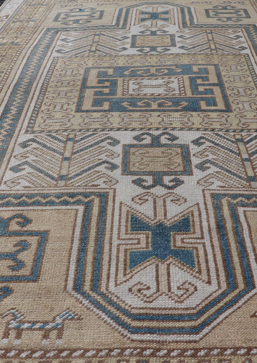 Measures: 3'5 x 5'8 Vintage Turkish Medallion Oushak Rug in Blue, Mocha, and Taupe. Country of Origin: Turkey; Type: Oushak; Design: Medallion, Tribal Medallion, Floral Medallion; Keivan Woven Arts: rug TU - MTU - 4670. Unique in its color palette ... - Keivan Woven ArtsTU - MTU - 4670 - 22902Rug