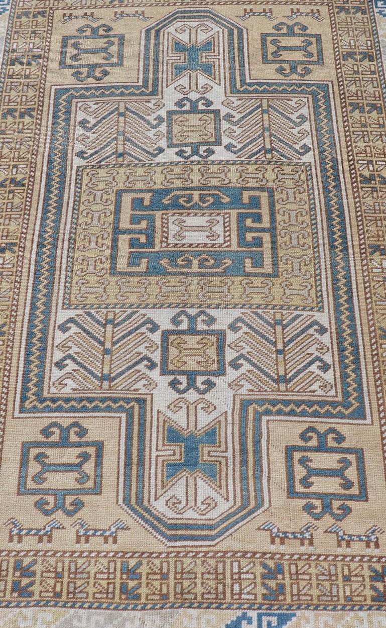 Measures: 3'5 x 5'6 Vintage Turkish Medallion Oushak Rug in Blue, Mocha, and Taupe. Country of Origin: Turkey; Type: Oushak; Design: Medallion, Tribal Medallion, Floral Medallion; Keivan Woven Arts: rug TU - MTU - 4671. Unique in its color palette ... - Keivan Woven ArtsTU - MTU - 4671 - 22908Rug