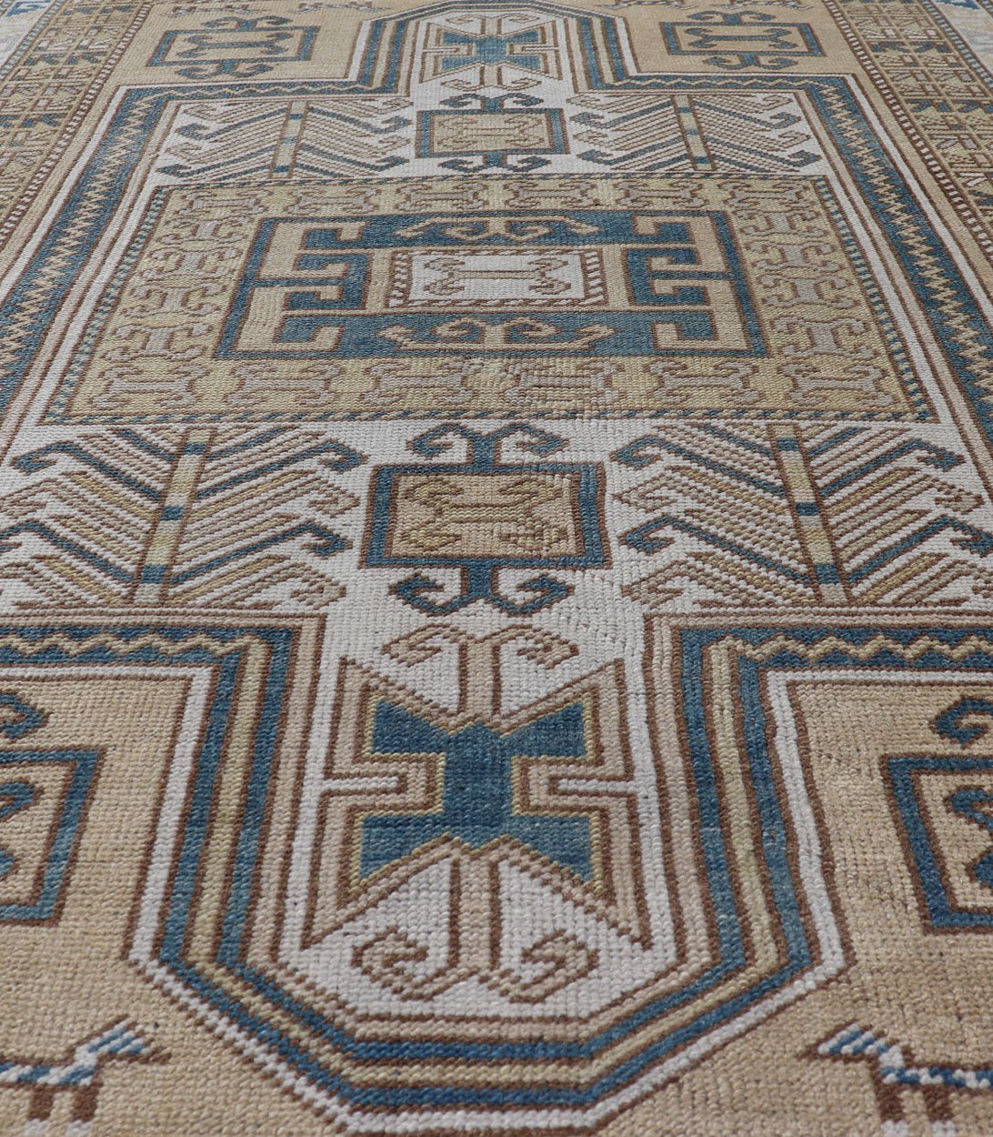 Measures: 3'5 x 5'6 Vintage Turkish Medallion Oushak Rug in Blue, Mocha, and Taupe. Country of Origin: Turkey; Type: Oushak; Design: Medallion, Tribal Medallion, Floral Medallion; Keivan Woven Arts: rug TU - MTU - 4671. Unique in its color palette ... - Keivan Woven ArtsTU - MTU - 4671 - 22908Rug