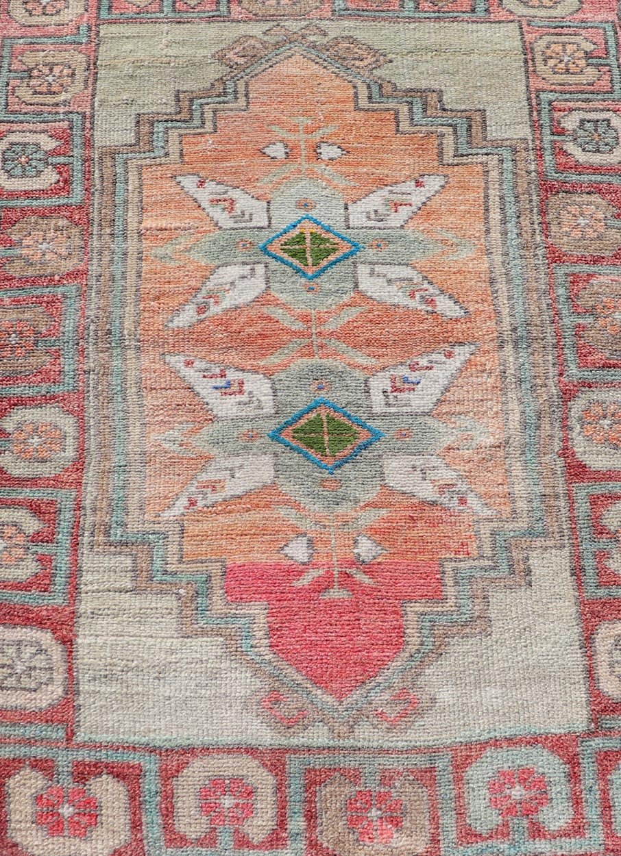 Measures: 2'4 x 3'4 Turkish Vintage Tribal Large Medallion Oushak With Shell Flower Design Border. Country of origin: Turkey; type: Oushak; design: Medallion; Keivan Woven Arts: rug TU - MTU - 4675. This beautiful rug from mid - 20th century Turk... - Keivan Woven ArtsTU - MTU - 4675 - 22057Rug