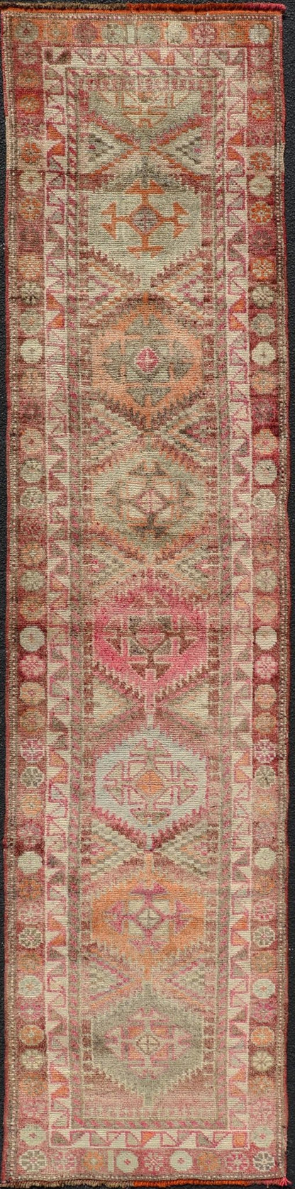 Measures: 2'7 x11'8 Vintage Unique Oushak Runner with Tribal Designs and Geometric Motifs. Keivan Woven Arts / rug TU - NED - 4684, country of origin / type: Turkey / Oushak, circa 1960 This vintage runner features an assortment of tribal designs an... - Keivan Woven ArtsTU - MTU - 4684 - 22087Rug