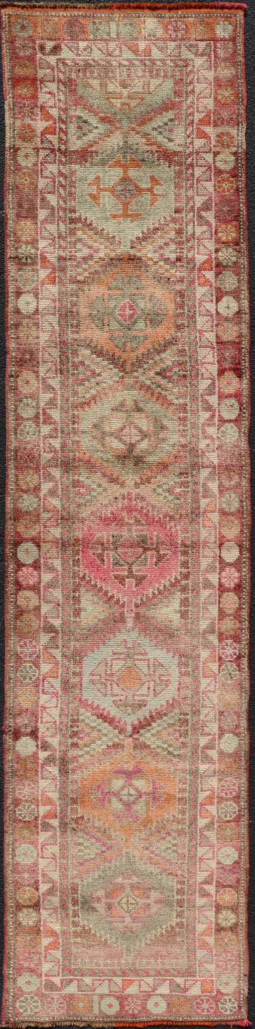 Measures: 2'7 x11'8 Vintage Unique Oushak Runner with Tribal Designs and Geometric Motifs. Keivan Woven Arts / rug TU - NED - 4684, country of origin / type: Turkey / Oushak, circa 1960 This vintage runner features an assortment of tribal designs an... - Keivan Woven ArtsTU - MTU - 4684 - 22087Rug