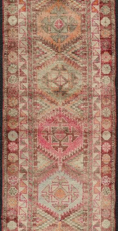 Measures: 2'7 x11'8 Vintage Unique Oushak Runner with Tribal Designs and Geometric Motifs. Keivan Woven Arts / rug TU - NED - 4684, country of origin / type: Turkey / Oushak, circa 1960 This vintage runner features an assortment of tribal designs an... - Keivan Woven ArtsTU - MTU - 4684 - 22087Rug
