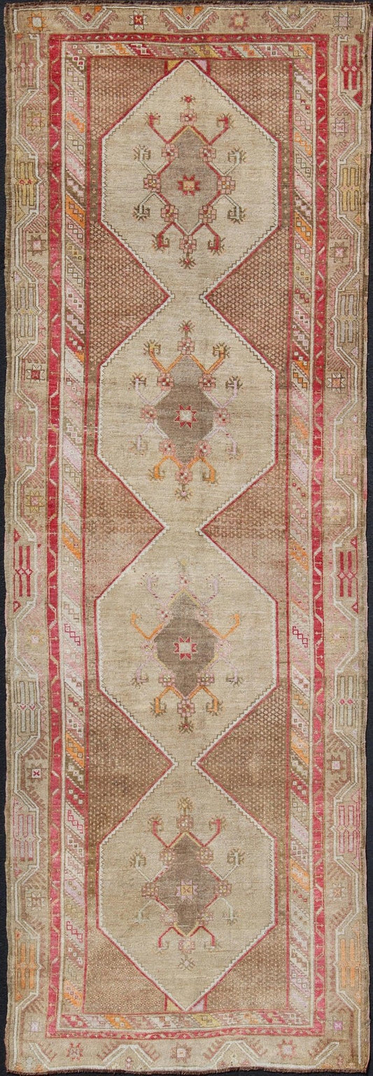 Turkish Oushak Gallery Rug with Multi - Medallion Design in Earth Tones and Red accent. Vintage Oushak Carpet with Tribal Medallion Design, rug TU - MTU - 4820, country of origin / type: Turkey / Oushak, circa 1940 This vintage Oushak carpet fr... - Keivan Woven ArtsTU - MTU - 4820 - 10768