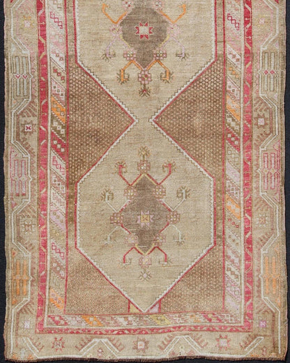 Turkish Oushak Gallery Rug with Multi - Medallion Design in Earth Tones and Red accent. Vintage Oushak Carpet with Tribal Medallion Design, rug TU - MTU - 4820, country of origin / type: Turkey / Oushak, circa 1940 This vintage Oushak carpet fr... - Keivan Woven ArtsTU - MTU - 4820 - 10768Rug