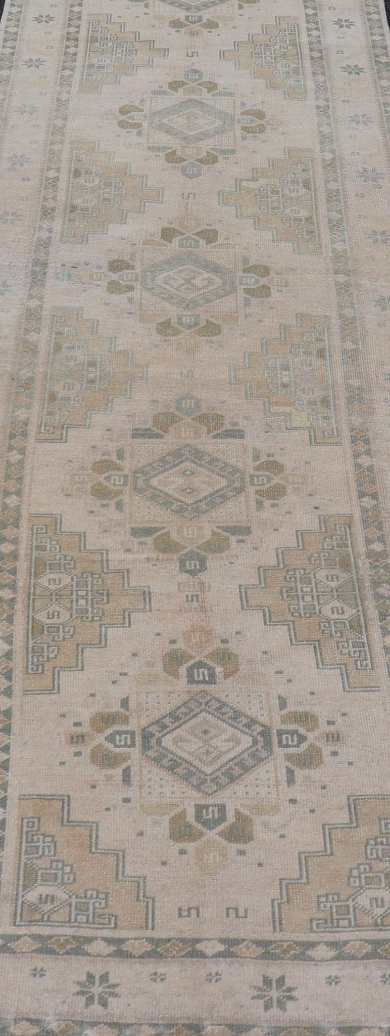 Vintage Turkish Oushak Runner in Neutral Tones , Taupe, Gray Green, Yellow. Vintage Turkish Oushak Runner in Neutral & Warm Colors with Tribal Medallions, rug TU - MTU - 4870, country of origin / type: Turkey / Oushak, circa mid - 20th. Measur... - Keivan Woven ArtsTU - MTU - 4870 - 18619Rug