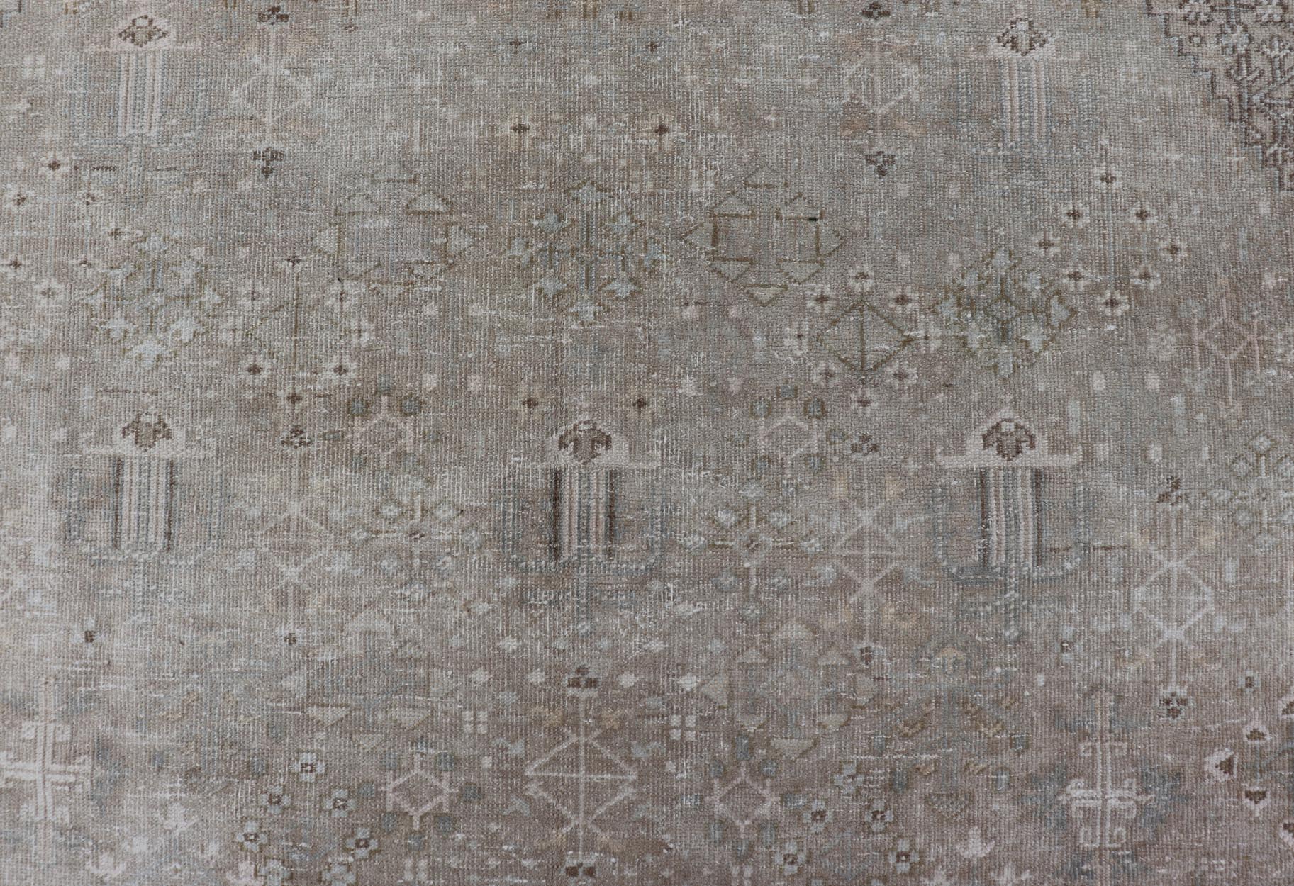 Muted Antique Persian Joshegan Rug with Sub - Geometric All - Over Design Measures: 7'8 x 11'0 This antique Joshegan rug beautifully displays the Persian expertise of this period. The taupe background is heavily decorated with motifs, as wel... - Keivan Woven ArtsTU - MTU - 4875 - 18950Rug