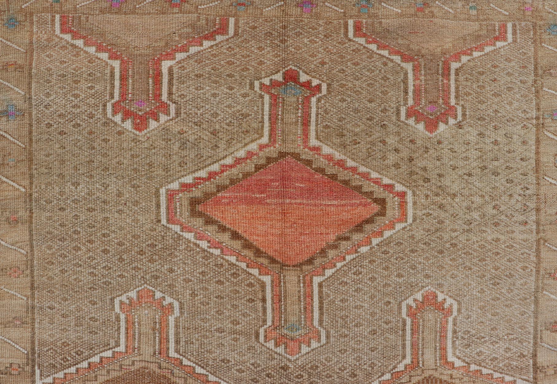 Unique & Colorful Turkish Kars Runner with Tribal Designs and Geometric Motifs Vintage Turkish runner in tan background, accent colors, orange, tan, ivory, pink, taupe, Keivan Woven Arts / rug/TU - MTU - 4879, country of origin / type: Turkey / Oush... - Keivan Woven ArtsTU - MTU - 4879 - 18962Rug