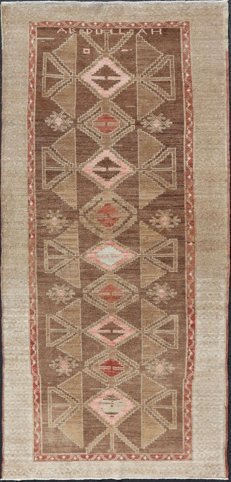 Hand Knotted Colorful Turkish Kars with Tribal Designs and Geometric Motifs Vintage Turkish in Brown background and taupe border with accent colors, red, pink, tan, green, taupe. Keivan Woven Arts / rug /TU - MTU - 4880, country of origin / type: Tu... - Keivan Woven ArtsTU - MTU - 4880 - 18968Rug