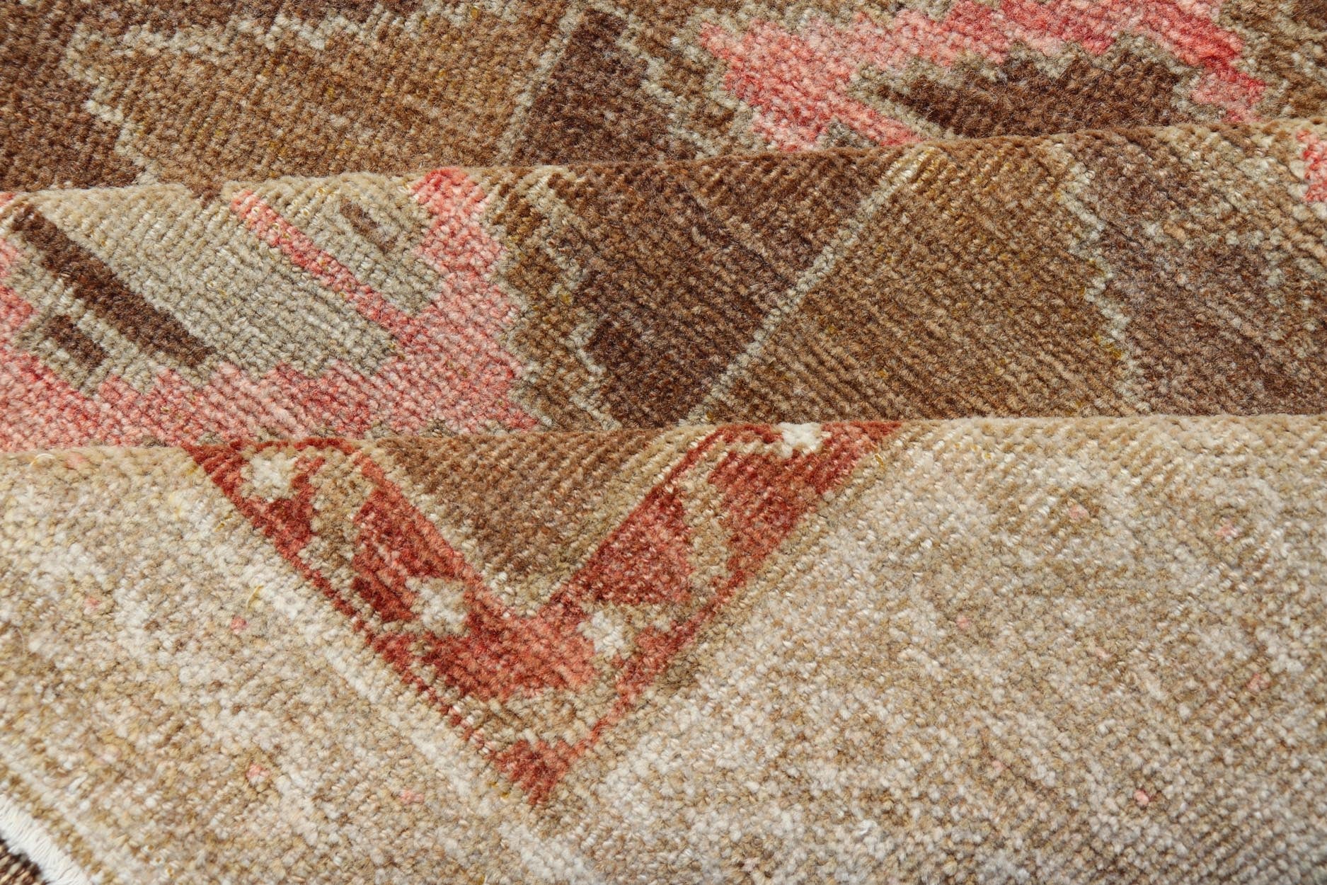 Hand Knotted Colorful Turkish Kars with Tribal Designs and Geometric Motifs Vintage Turkish in Brown background and taupe border with accent colors, red, pink, tan, green, taupe. Keivan Woven Arts / rug /TU - MTU - 4880, country of origin / type: Tu... - Keivan Woven ArtsTU - MTU - 4880 - 18968Rug