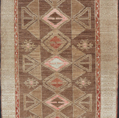 Hand Knotted Colorful Turkish Kars with Tribal Designs and Geometric Motifs Vintage Turkish in Brown background and taupe border with accent colors, red, pink, tan, green, taupe. Keivan Woven Arts / rug /TU - MTU - 4880, country of origin / type: Tu... - Keivan Woven ArtsTU - MTU - 4880 - 18968Rug