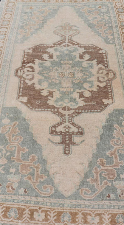 Midcentury Turkish Oushak Rug in Wool with Sub - Geometric Etched Medallion Design This antique Turkish Oushak rug has been hand - knotted in wool and features a sub - geometric etched medallion design rendered in cream, blue and taupe tones. A compl... - Keivan Woven ArtsTU - MTU - 4887 - 18974Rug