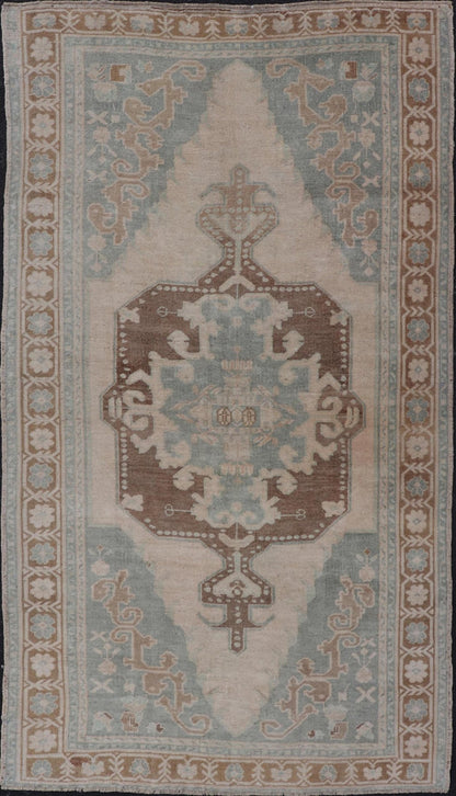 Midcentury Turkish Oushak Rug in Wool with Sub - Geometric Etched Medallion Design This antique Turkish Oushak rug has been hand - knotted in wool and features a sub - geometric etched medallion design rendered in cream, blue and taupe tones. A compl... - Keivan Woven ArtsTU - MTU - 4887 - 18974Rug