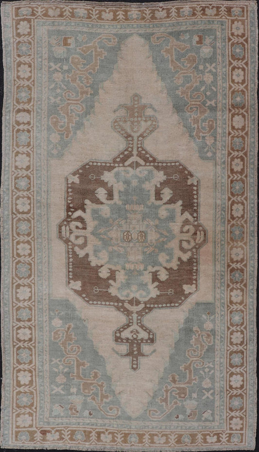 Midcentury Turkish Oushak Rug in Wool with Sub - Geometric Etched Medallion Design This antique Turkish Oushak rug has been hand - knotted in wool and features a sub - geometric etched medallion design rendered in cream, blue and taupe tones. A compl... - Keivan Woven ArtsTU - MTU - 4887 - 18974Rug