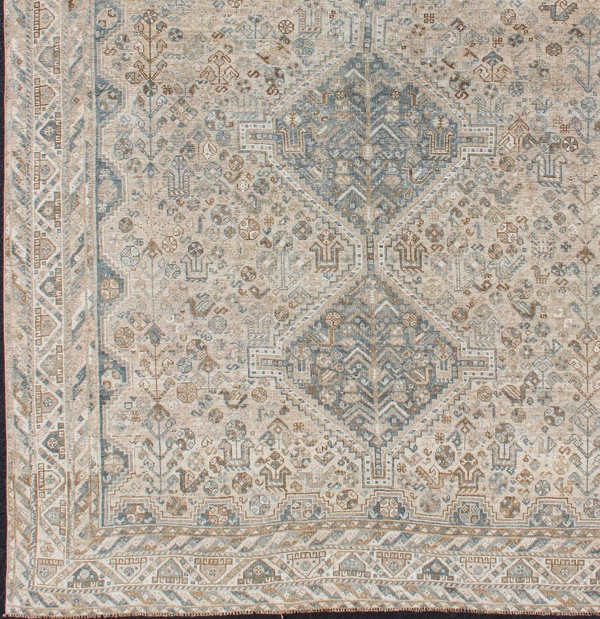Blue/Taupe/ an Antique Persian Shiraz Rug with Tribal Geometric Medallions Persian Shiraz rug with Vertical Sub - Geometric Medallions, rug DSP - A342934, country of origin / type: Iran / Shiraz, circa 1920 Persian Shiraz rug with Vertical Sub - ... - Keivan Woven ArtsTU - MTU - 4904 - 12144