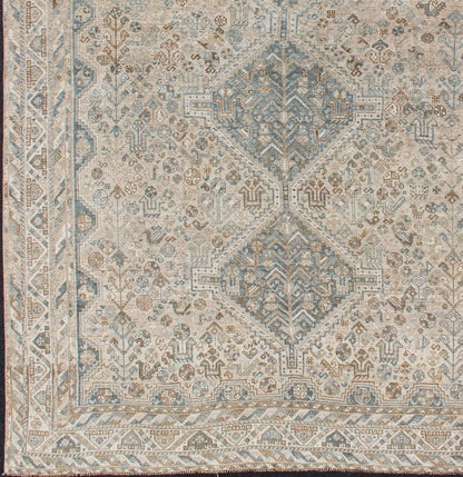 Blue/Taupe/ an Antique Persian Shiraz Rug with Tribal Geometric Medallions Persian Shiraz rug with Vertical Sub - Geometric Medallions, rug DSP - A342934, country of origin / type: Iran / Shiraz, circa 1920 Persian Shiraz rug with Vertical Sub - ... - Keivan Woven ArtsTU - MTU - 4904 - 12144