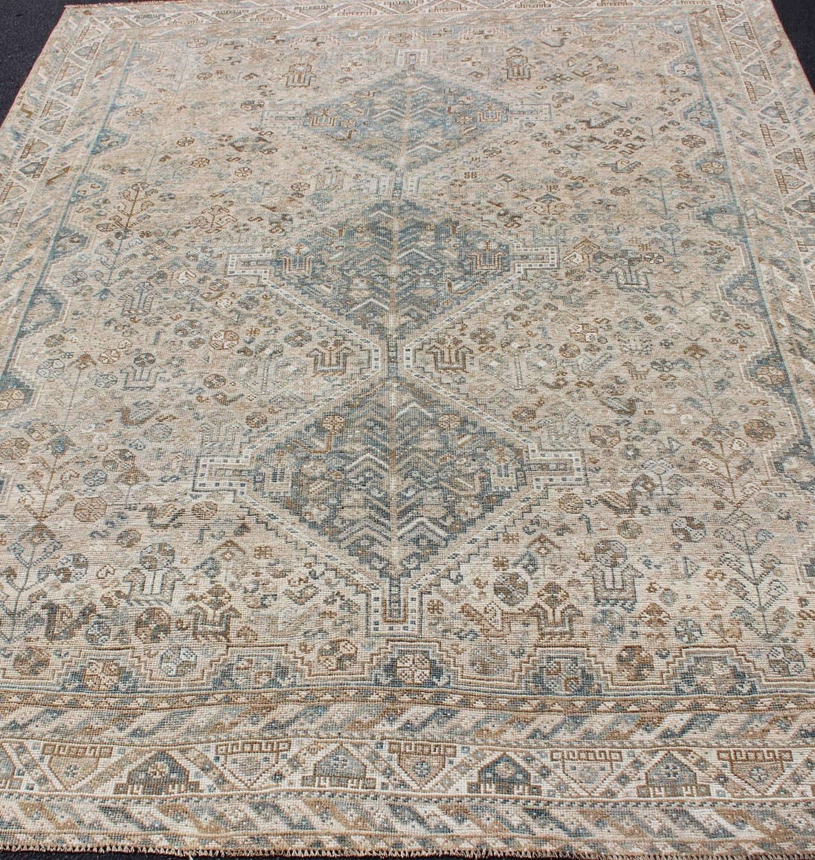 Blue/Taupe/ an Antique Persian Shiraz Rug with Tribal Geometric Medallions Persian Shiraz rug with Vertical Sub - Geometric Medallions, rug DSP - A342934, country of origin / type: Iran / Shiraz, circa 1920 Persian Shiraz rug with Vertical Sub - ... - Keivan Woven ArtsTU - MTU - 4904 - 12144
