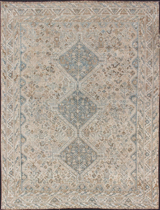 Blue/Taupe/ an Antique Persian Shiraz Rug with Tribal Geometric Medallions Persian Shiraz rug with Vertical Sub - Geometric Medallions, rug DSP - A342934, country of origin / type: Iran / Shiraz, circa 1920 Persian Shiraz rug with Vertical Sub - ... - Keivan Woven ArtsTU - MTU - 4904 - 12144Rug