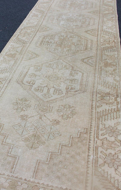 Subdued Vintage Hand Knotted Turkish Oushak Runner With Medallions in Soft Cream Lightly toned vintage Turkish Runner with Oushak design, Keivan Woven Arts / rug TU - MTU - 4909, country of origin / type: Turkey / Oushak, circa 1940. This vin... - Keivan Woven ArtsTU - MTU - 4909 - 12148Rug