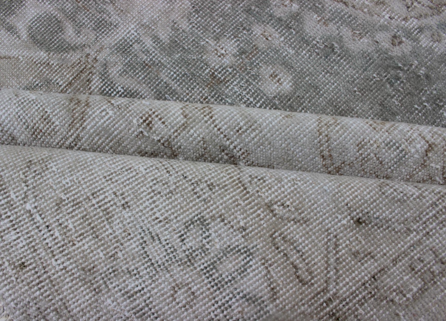 Distressed Turkish Carpet with Floral Design in Gray Green, Brown and Ivory Turkish carpet with distressed Floral design in gray green, cream and light brown highlights. Keivan Woven Arts, Rug / TU - MTU - 4942, mid - 20th century, Turkey ... - Keivan Woven ArtsTU - MTU - 4942 - 12180Rug