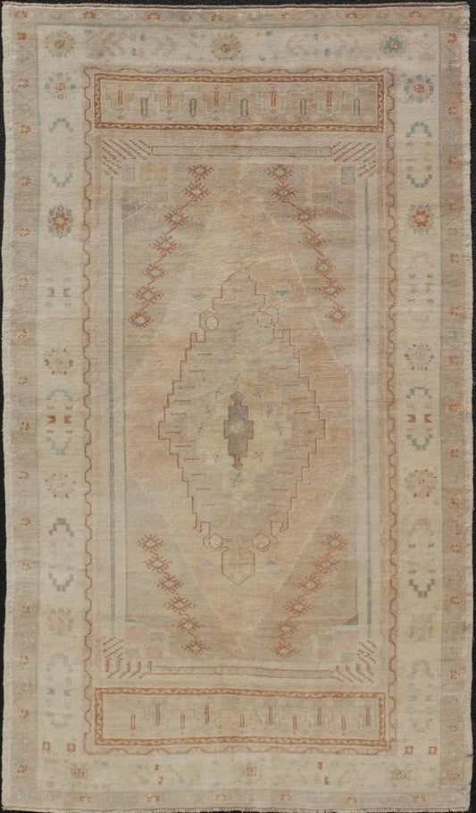Vintage Oushak Rug from Turkey with Muted Colors and Tribal Medallion. Vintage Oushak Turkish Rug from Anatolian region of Turkey displays Muted colors and delicate tones with Florals and geometric medallion. Keivan Woven Arts rug/ TU - MTU - 4948 ... - Keivan Woven ArtsTU - MTU - 4948 - 18980
