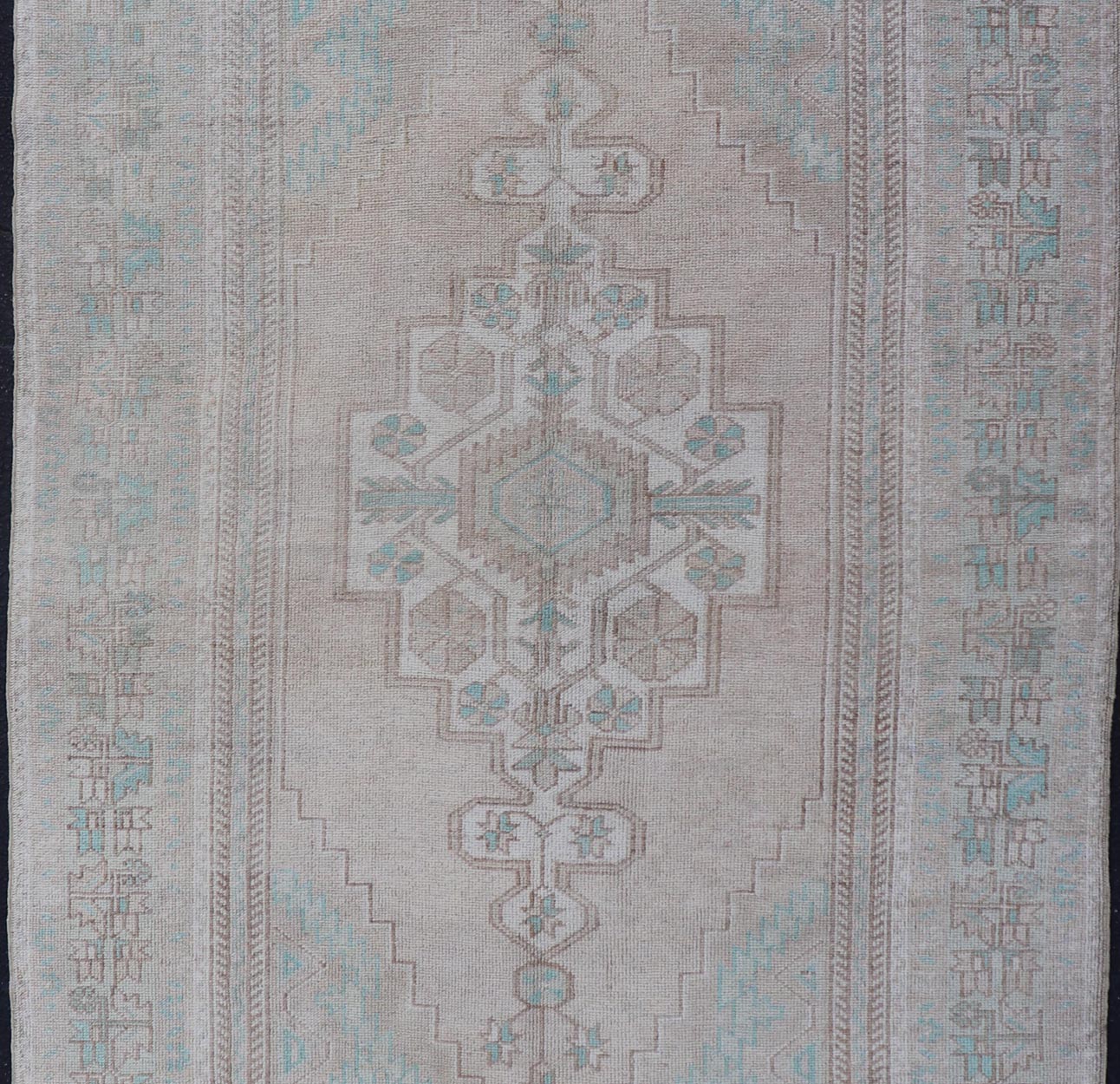 Vintage Turkish Medallion Oushak Area Rug in Tan, Taupe, Pink, and Green Measures: 4'7 x 8'4 This vintage beauty was hand - knotted in Turkey during the 1950's. Vintage Oushak rugs are incredibly popular for their durability, as well as t... - Keivan Woven ArtsTU - MTU - 4949 - 19208Rug