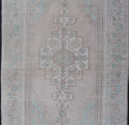 Vintage Turkish Medallion Oushak Area Rug in Tan, Taupe, Pink, and Green Measures: 4'7 x 8'4 This vintage beauty was hand - knotted in Turkey during the 1950's. Vintage Oushak rugs are incredibly popular for their durability, as well as t... - Keivan Woven ArtsTU - MTU - 4949 - 19208Rug