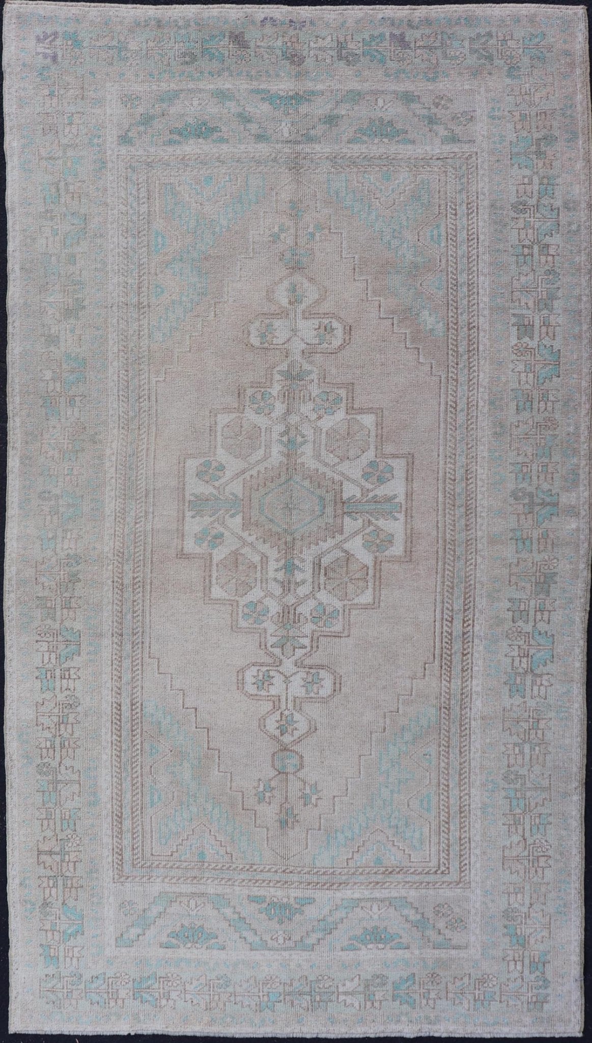 Vintage Turkish Medallion Oushak Area Rug in Tan, Taupe, Pink, and Green Measures: 4'7 x 8'4 This vintage beauty was hand - knotted in Turkey during the 1950's. Vintage Oushak rugs are incredibly popular for their durability, as well as t... - Keivan Woven ArtsTU - MTU - 4949 - 19208Rug