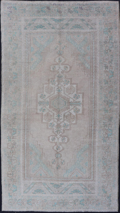 Vintage Turkish Medallion Oushak Area Rug in Tan, Taupe, Pink, and Green Measures: 4'7 x 8'4 This vintage beauty was hand - knotted in Turkey during the 1950's. Vintage Oushak rugs are incredibly popular for their durability, as well as t... - Keivan Woven ArtsTU - MTU - 4949 - 19208Rug