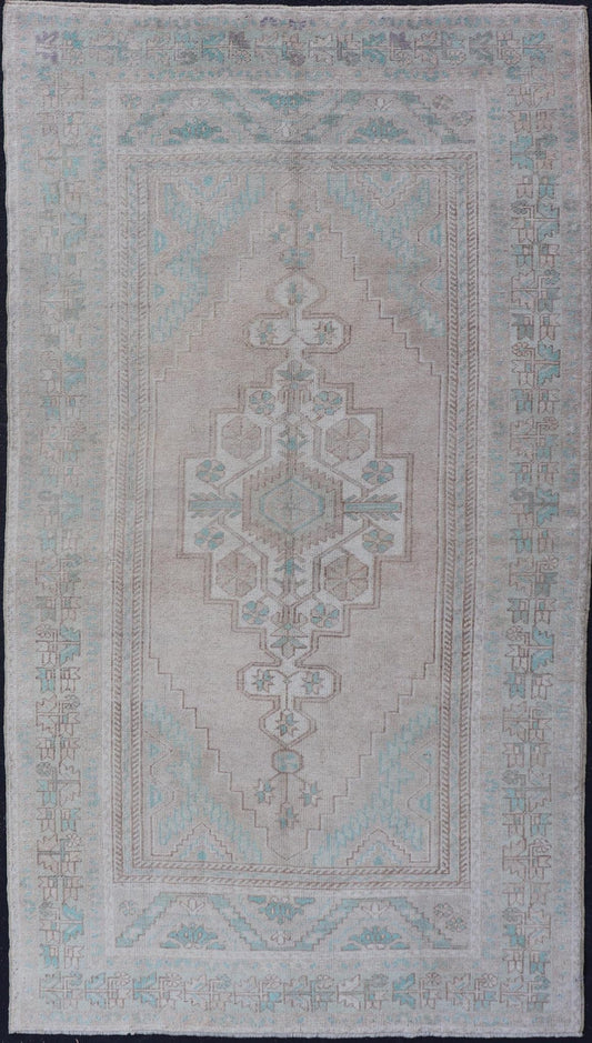 Vintage Turkish Medallion Oushak Area Rug in Tan, Taupe, Pink, and Green Measures: 4'7 x 8'4 This vintage beauty was hand - knotted in Turkey during the 1950's. Vintage Oushak rugs are incredibly popular for their durability, as well as t... - Keivan Woven ArtsTU - MTU - 4949 - 19208Rug