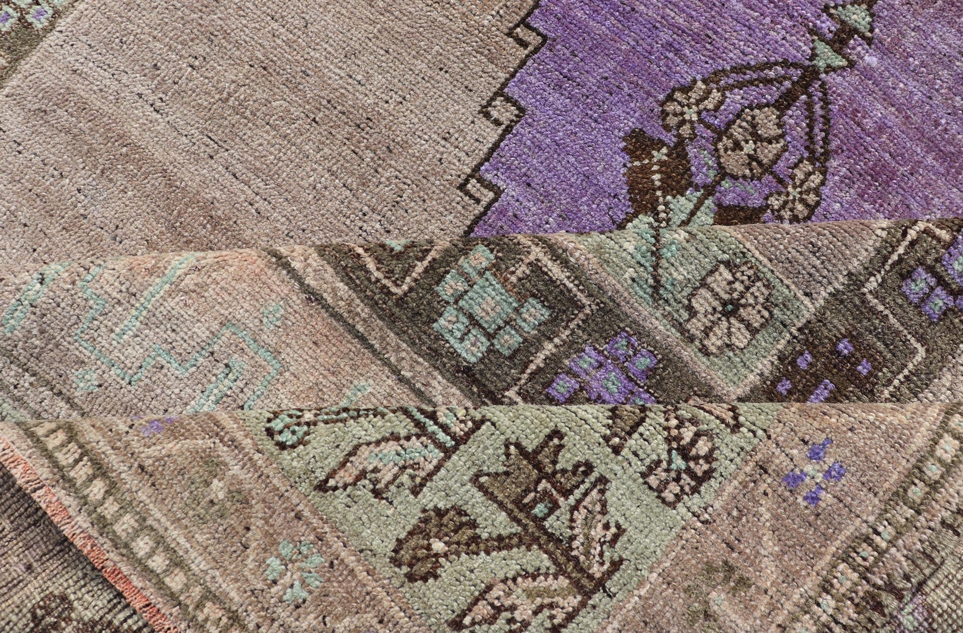 Medallion Design Vintage Oushak Rug in Brown, Mint Green, and Purple Vintage Turkish Medallion Oushak rug in in purple. Keivan Woven Arts / rug TU - MTU - 4950, country of origin / type: Turkey / Oushak, circa 1940 Measures: 4'10 x 9'10 - Keivan Woven ArtsTU - MTU - 4950 - 18986Rug