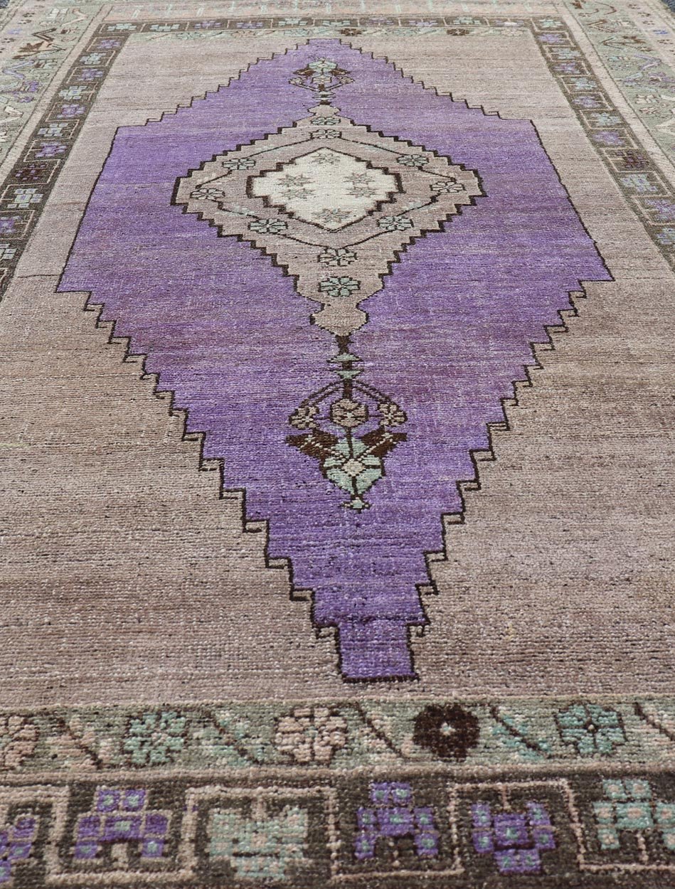 Medallion Design Vintage Oushak Rug in Brown, Mint Green, and Purple Vintage Turkish Medallion Oushak rug in in purple. Keivan Woven Arts / rug TU - MTU - 4950, country of origin / type: Turkey / Oushak, circa 1940 Measures: 4'10 x 9'10 - Keivan Woven ArtsTU - MTU - 4950 - 18986Rug
