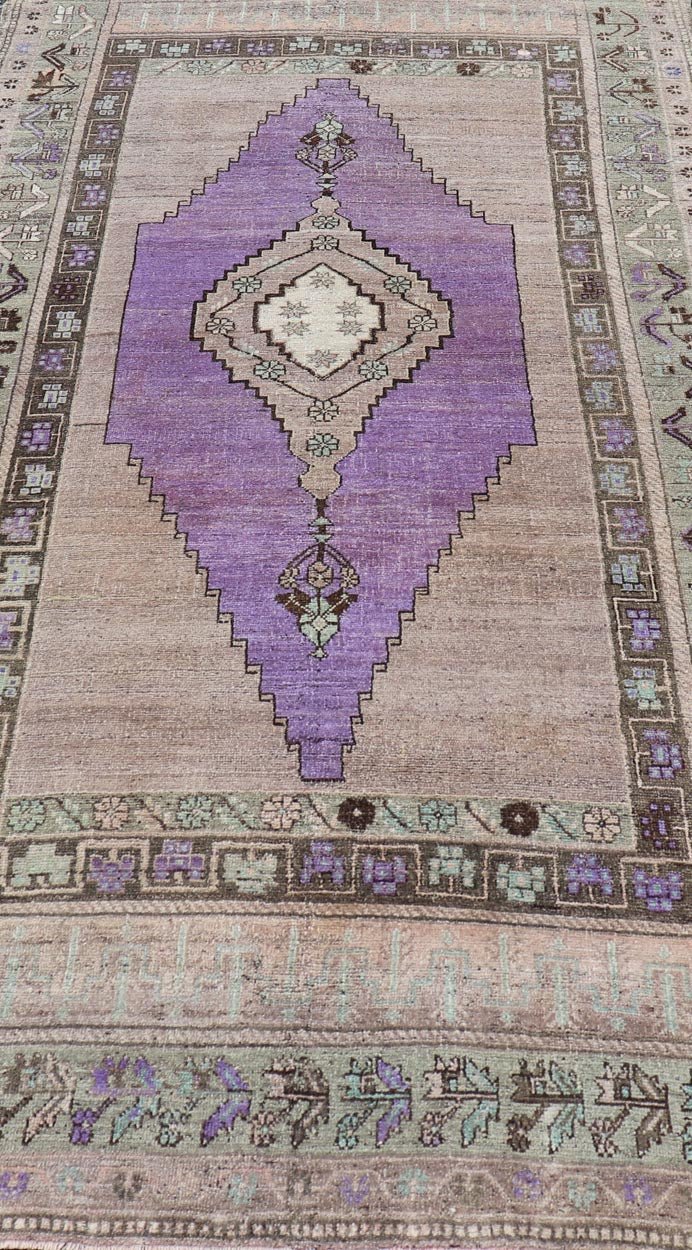 Medallion Design Vintage Oushak Rug in Brown, Mint Green, and Purple Vintage Turkish Medallion Oushak rug in in purple. Keivan Woven Arts / rug TU - MTU - 4950, country of origin / type: Turkey / Oushak, circa 1940 Measures: 4'10 x 9'10 - Keivan Woven ArtsTU - MTU - 4950 - 18986Rug